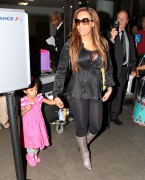 Мелани Браун (Melanie Brown) Arriving on a flight at LAX airport in Los Angeles April 15, 2011 - 29xHQ 07f22e201667795